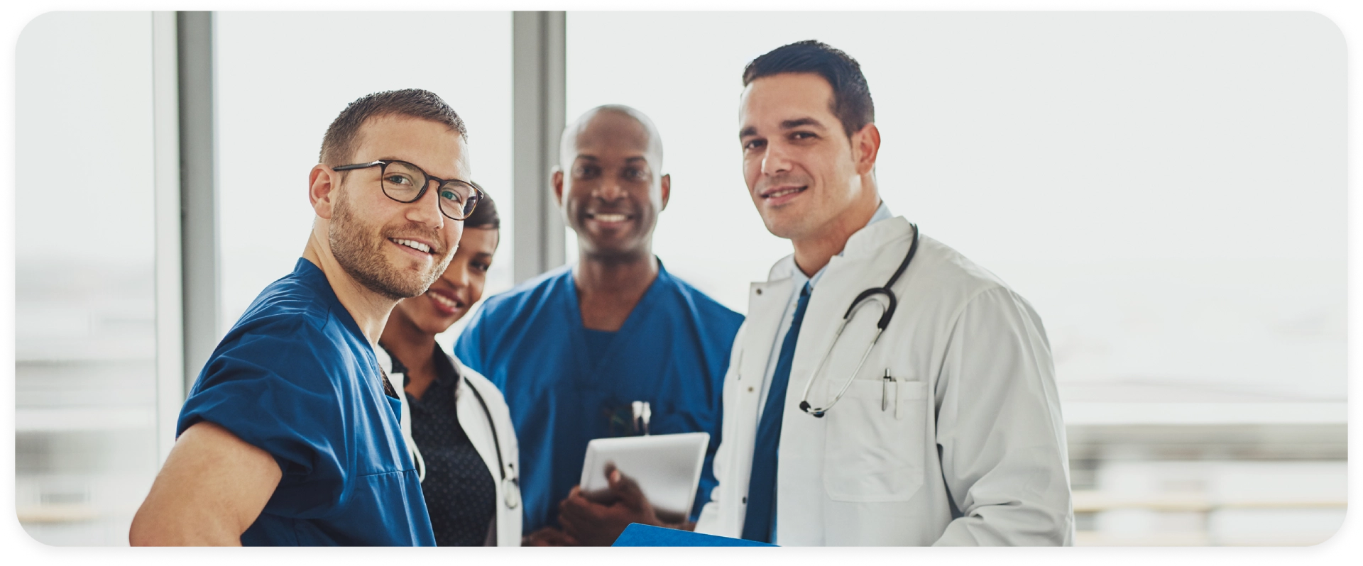 A group of doctors standing next to each other.